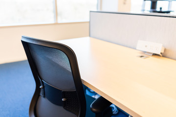 Wall Mural - New office room with closeup of chair wooden table and power outlet architecture and nobody by cubicle corporate desk