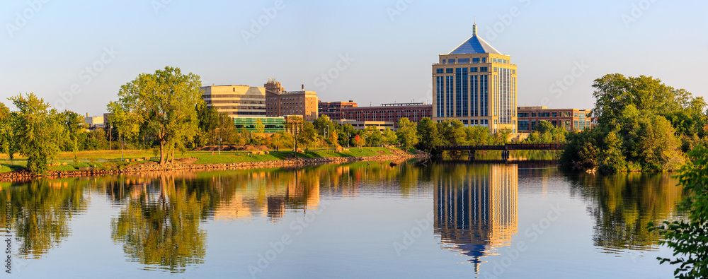 Reflection of downtown Wausau, Wisconsin in the Wisconsin River in Late summer - obrazy, fototapety, plakaty 