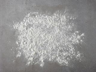 white flour on grey kitchen table