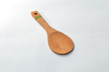 Wall Mural - rice spoon made from medium brown wood