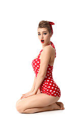 Poster - Surprised pin-up woman on white background