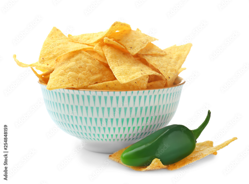Bowl with tasty nachos on white background