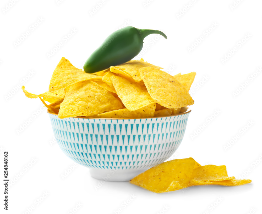 Bowl with tasty nachos on white background