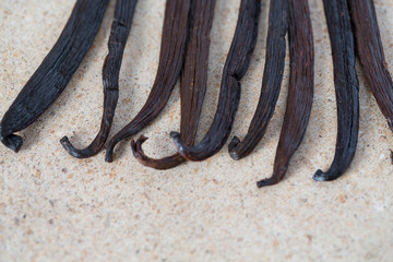 Wall Mural - vanilla beans on light background