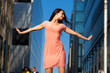 © Andrey_Arkusha - Beautiful brunette woman in sexy pink dress