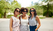 © Syda Productions - female friendship, people and leisure - happy young women in sunglasses at summer park
