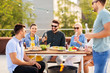 © Syda Productions - leisure and people concept - happy friends with non alcoholic drinks having bbq party on rooftop in summer
