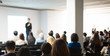 © Right 3 - 'Speaker on Stage at Conference Meeting Event. Presenter at Business Seminar Photo. Audience Watching a Manager Presentation. Blurred Image of Lecturer Presenting To Audience During Speech. '