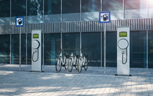 Electric Bicycle E-bike At Company Parking Lot With Electric Charging Station 3d Illustration