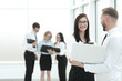 © yurolaitsalbert - employees use a laptop to prepare for a business seminar