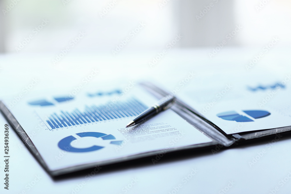 background image of a clipboard with financial report on table - obrazy, fototapety, plakaty 