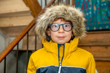 boy with a hood on his head