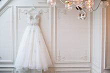 Luxury Wedding Lace Dress In The Classic Interior Of The Hotel