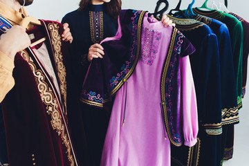 national bashkir costumes. peoples of russia. tatars on white background studio.