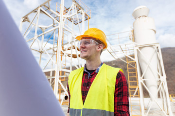 Wall Mural - Young engineer with project