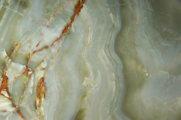 Green onyx with veins, the surface of natural stone