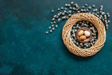 Easter Decoration – Easter Eggs In The Nest And Pussy Willow. Top View, Close Up, Flat Lay