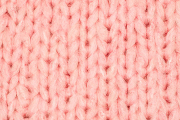 Wall Mural - Real pink knit texture. Background, pattern concept. Knitted fabric made of heathered yarn