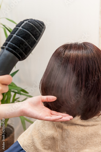 ヘアサロンでのヘアトリートメント ナノスチーム Stock Photo Adobe Stock