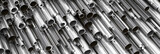 Fototapeta Perspektywa 3d - Close-up set of different diameters metal round tubes, pipes, gun barrels  and kernels. Industrial 3d illustration