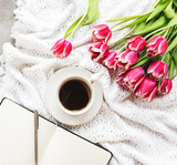 Fototapeta Tulipany - Cup of coffee and tulips