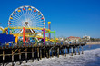 santa monica pier amusement park with coaster and big wheel