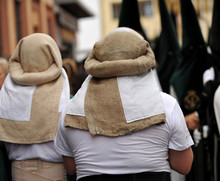 Procession Of Holy Week (Semana Santa) In Seville. Bearers (costaleros) Of The Brotherhood Of The Our Lady Of Hope (Esperanza) Of Triana. Spain