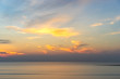 © Thanaphong - Background of colorful sky morning time. Sunrise on the beach and sea.