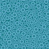 Fototapeta  - Seamless pattern, texture. Disjoint round elements of different sizes evenly scattered on blue background.