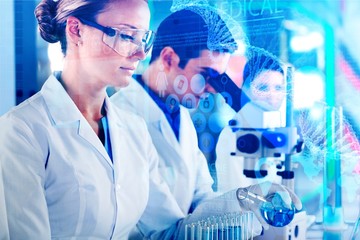 Wall Mural - Female and male scientists in glasses working