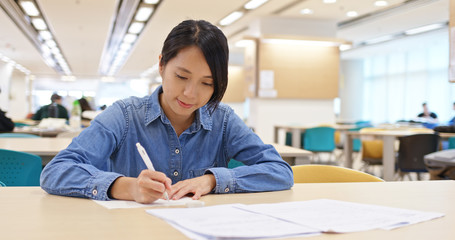 Wall Mural - Woman study at library