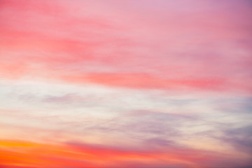 Wall Mural - sunset sky with pink orange light clouds. colorful smooth blue sky gradient. natural background of s