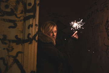 Wall Mural - Winter jacket woman lightnings in city