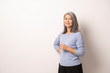© Svyatoslav Lypynskyy - Mongolian Beautiful Gray Haired Woman on a White Background.