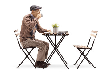 Poster - Senior man sitting alone and drinking coffee