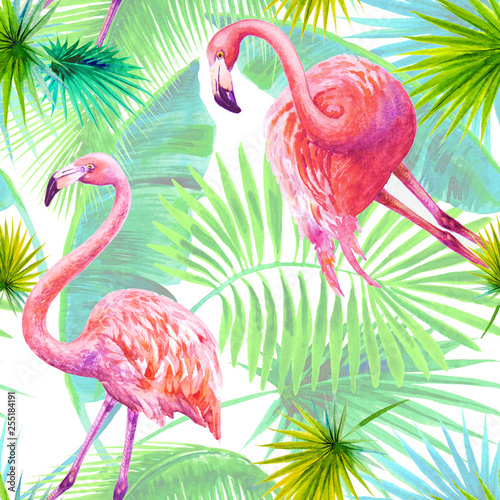 Tropical summer arrangements with flamingos, palm leaves and exotic orchids f...
