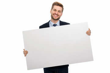 business man holding white board