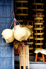 Wicker marketRattan basket.Rattan or bamboo handicraft hand made from natural straw basket.Basket wicker is Thai handmade. it is woven bamboo texture for background and design.Traditional Thai woven s