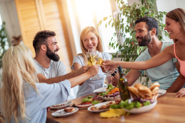 Wall Mural - Group of friends have lunch together