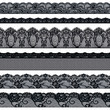 Set of elegant black lace ribbons on a white background. Lace braid.