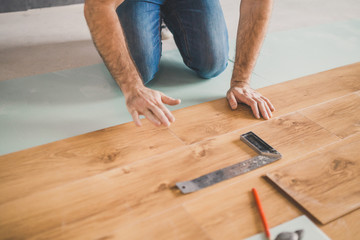 Wall Mural - Finishing work at home - laying a new laminate flooring