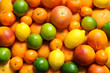 © New Africa - Different citrus fruits as background, top view