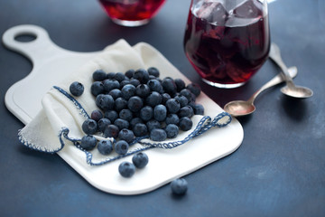 Wall Mural - Blueberry and juice on table top.