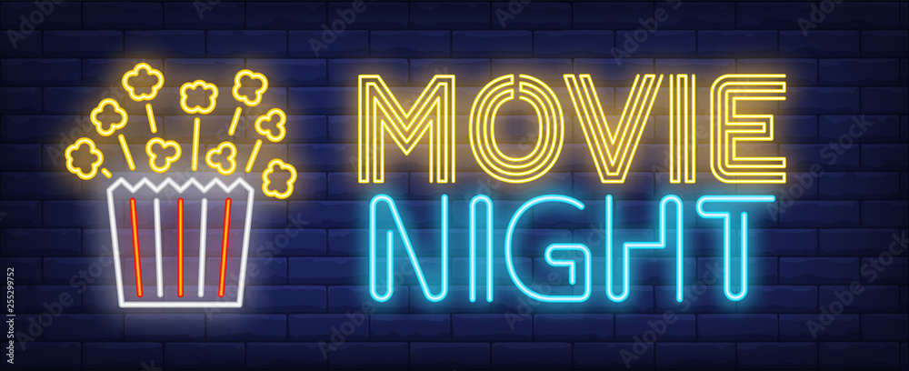 Movie night neon text with popcorn paper box - obrazy, fototapety, plakaty 