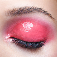 Girl with perfect skin and pink smoky eyes eye shadows