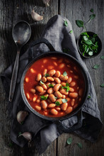 Spicy Baked Beans With Garlic And Fresh Tomatoes