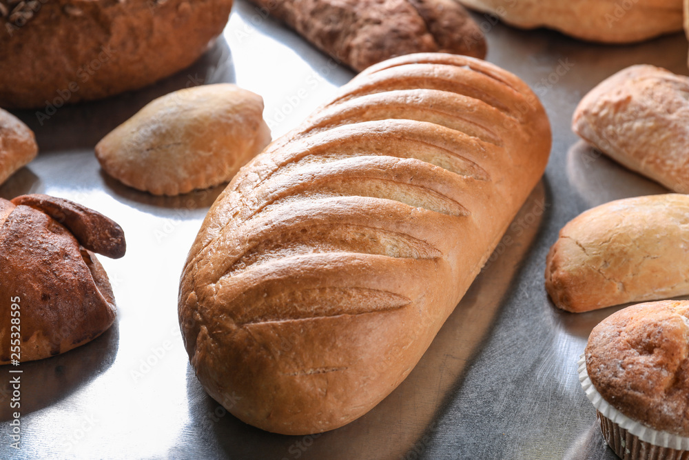 Assortment of tasty bakery products on table