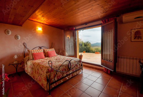 Nice Warm Interior Of Bedroom In A Rustic Style In Country