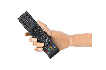 TV remote in wooden hand