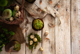 Fototapeta Kuchnia - Easter eggs and muffins with pistachio in a traditional rustic design